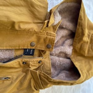 Ladies size small military safari vest with hoodie.